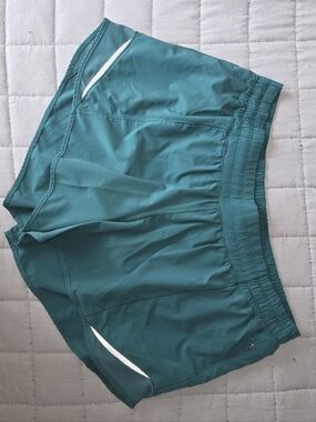 Moving Sale! { Teal Lululemon Hotty Hot Shorts Size 10/12